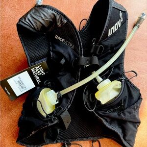 Inov-8 Race Ultra Hydration Vest. *new bottles have some discoloration see photo